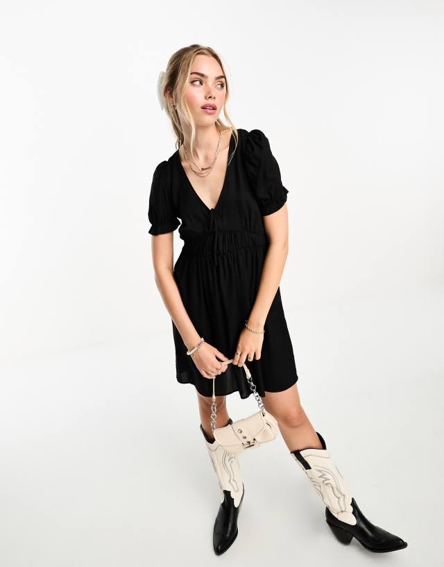 Monki - mini smock dress with puff sleeves in black