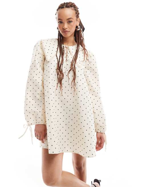 Monki mini swing dress with collar and tie cuffs in white polka dots print