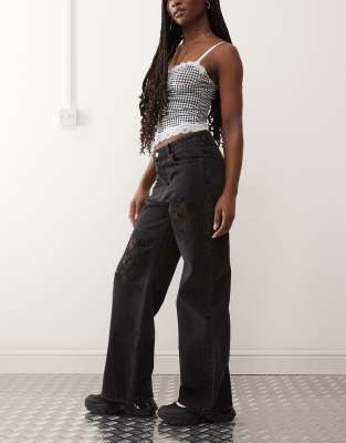 Monki Monki Missy low waist loose fit jeans with lace cur out detail in black