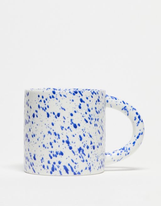 Monki - Mok met spetterprint in blauw