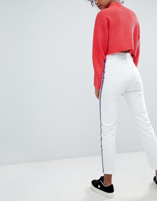 White jeans with stripe on sale side