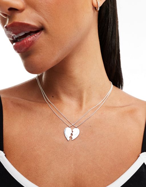 Monki necklace with half heart in silver