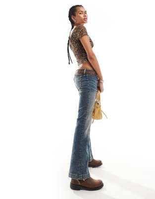 Monki Nicole low waist flared jeans with seam details in darkwash canyon blue