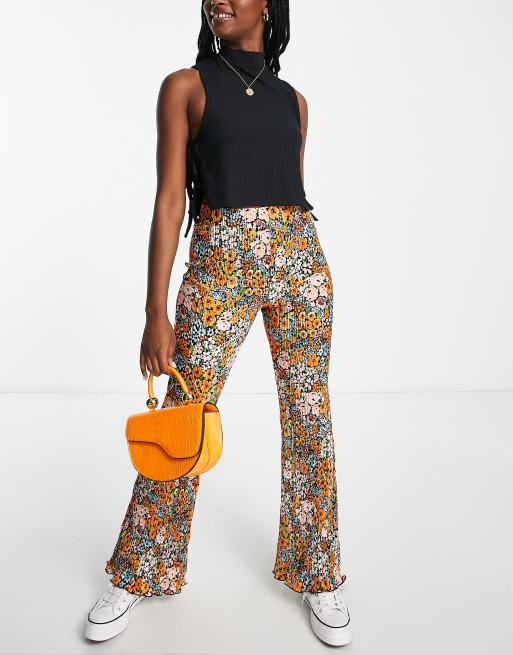 Monki - Ocean - Plissé flare-broek met regenboogkleurige bloemenprint