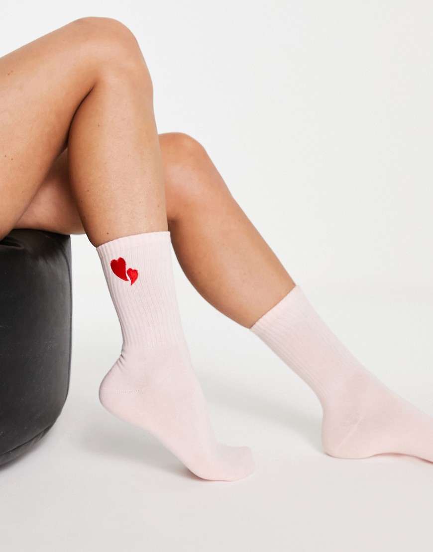 Monki organic cotton ankle heart embroidered socks in pink