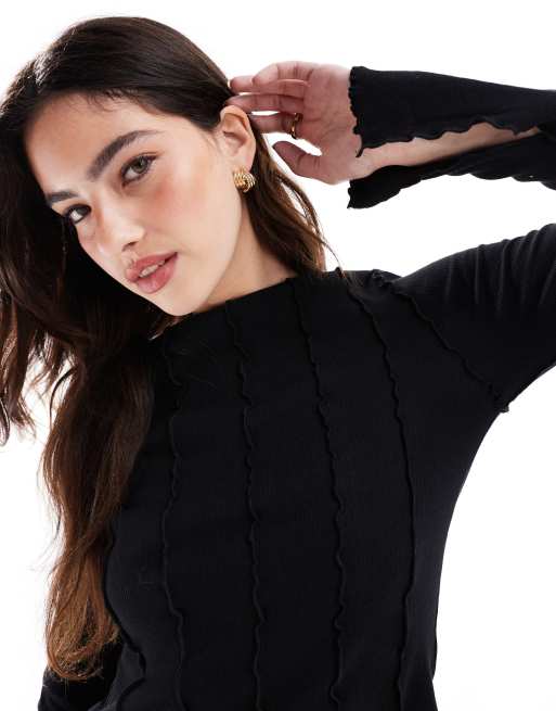 Monki overlock seam detail ribbed jersey top in black | ASOS