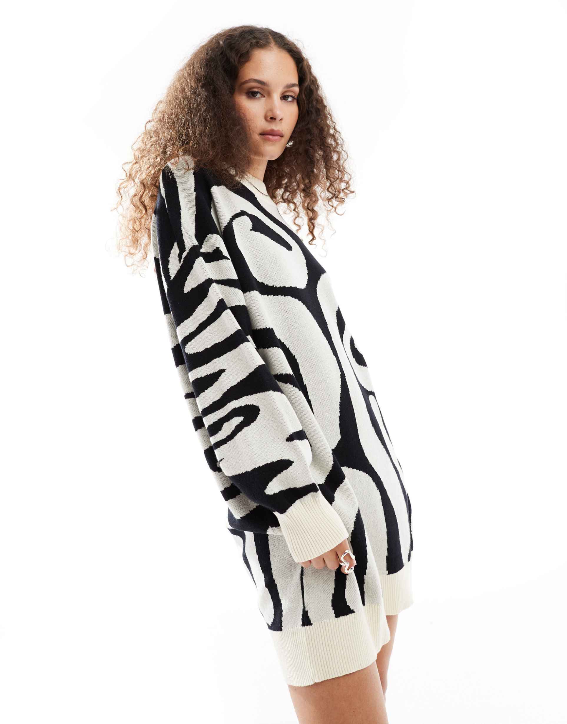 monki oversized knit jacquard mini dress in black and white swirl pattern