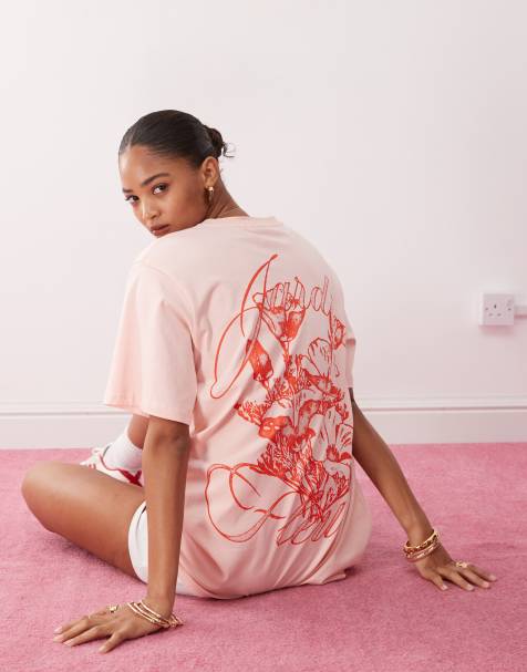 Monki oversized t-shirt with orange flower graphic in light pink - view 1
