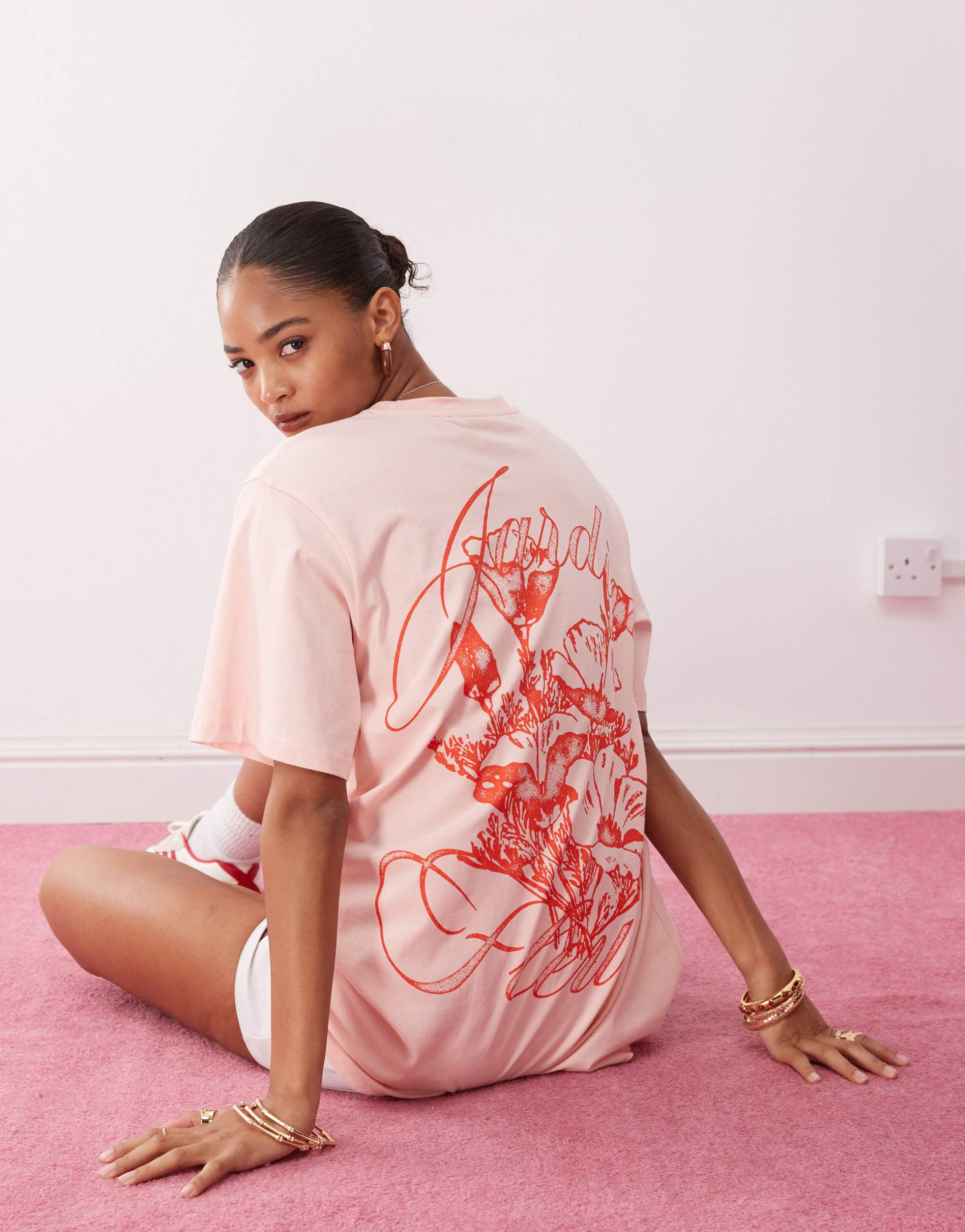 monki oversized t-shirt with orange flower graphic in light pink