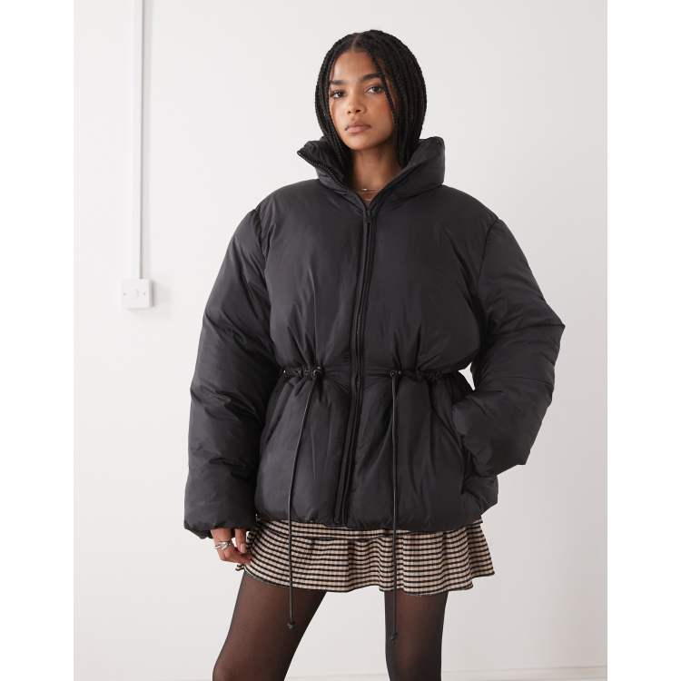Monki oversized tie cinch waist puffer jacket in black | ASOS