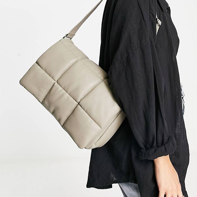 You will get better Glimpse Intolerable Monki padded bag in beige | ASOS