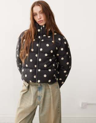 padded puffer jacket in black polka dot