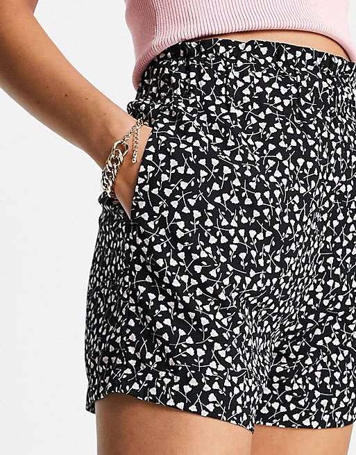 Monki high waist shorts in black and blush floral print