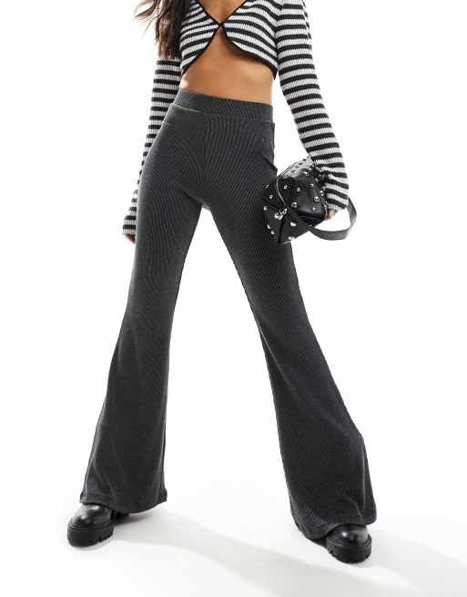 Monki - Pantalon évasé en jersey côtelé bicolore - Noir