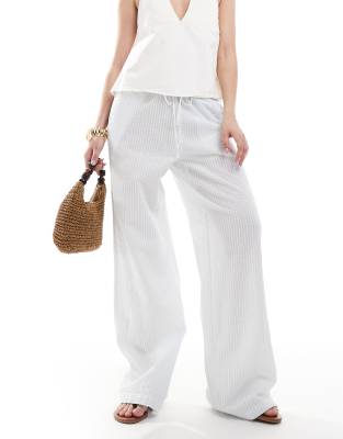 Monki - Pantalon large en crépon rayé avec cordon de serrage à la taille - Bleu et blanc