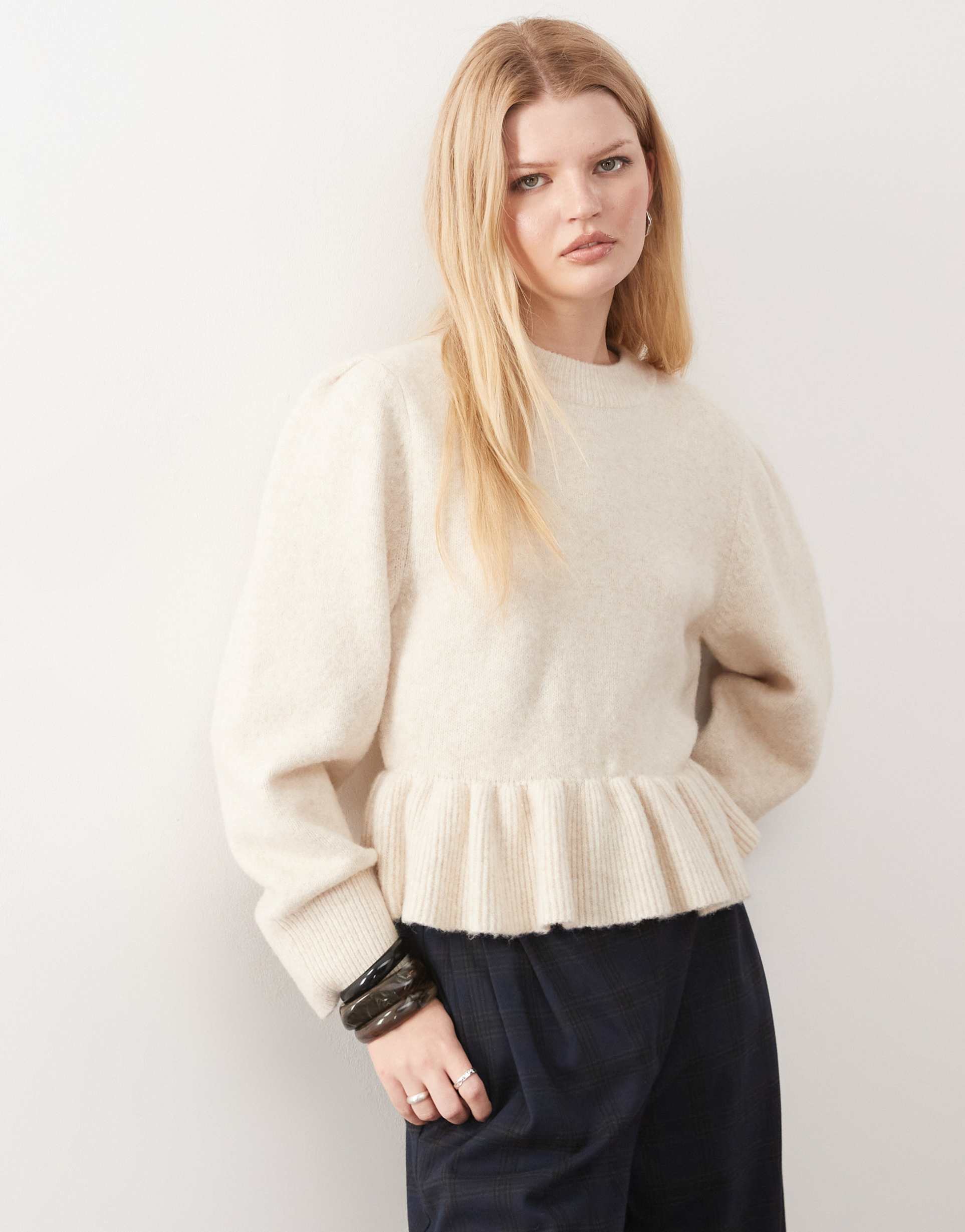 monki peplum ruffle knit sweater in cream