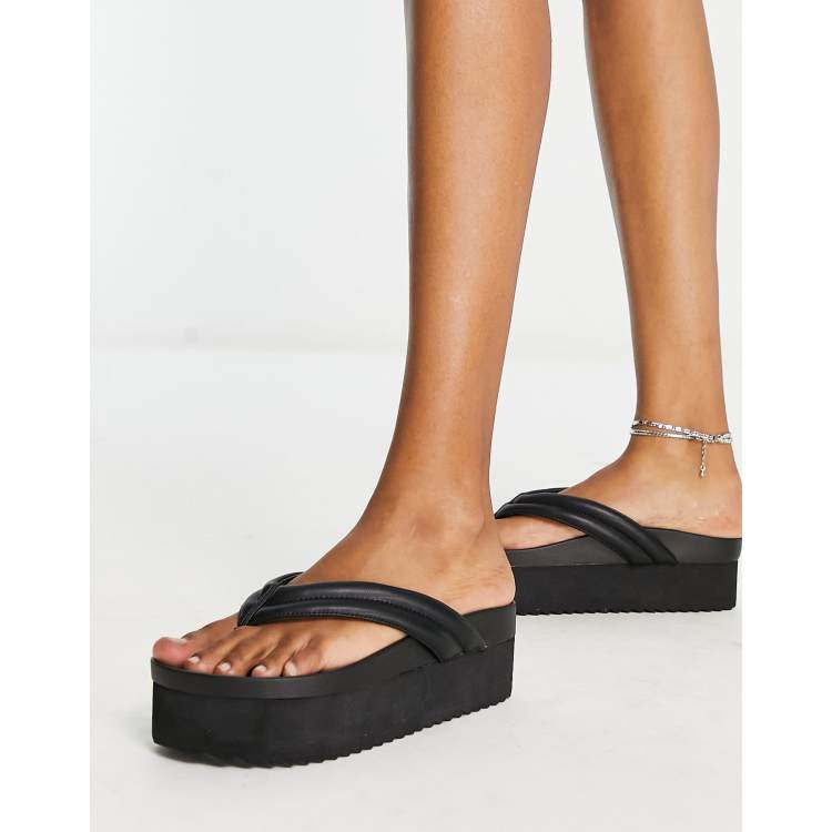 Monki platform thong sandal in black ASOS