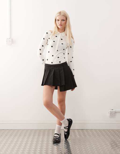 Monki pleated mini skirt with asymmetric hem in black