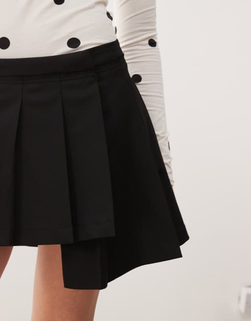 Monki pleated mini skirt with asymmetric hem in black