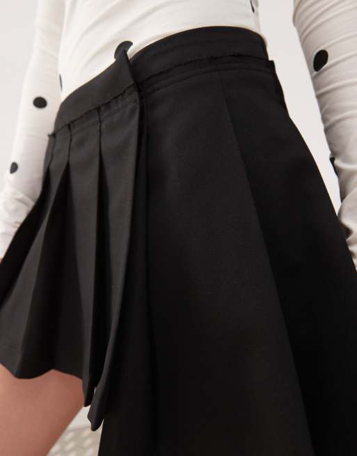Monki pleated mini skirt with asymmetric hem in black | ASOS