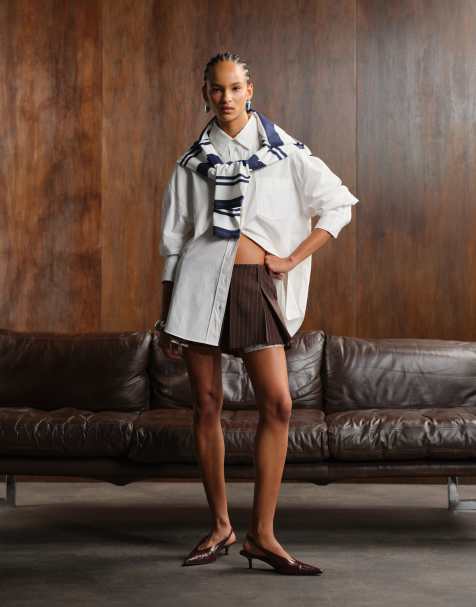 Monki pleated mini skirt with frayed edge and pocket detail in brown stripe - view 1