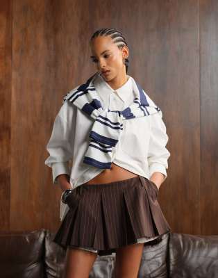 Monki Pleated Mini Skirt With Frayed Edge And Pocket Detail In Brown