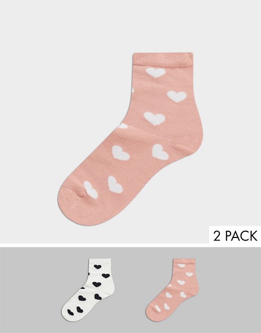 Monki Polly organic blend cotton 2 pack heart print socks in pink and white