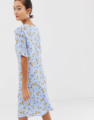 light blue dress with yellow flowers