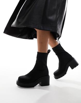 Monki pull up platform heeled ankle boot in black