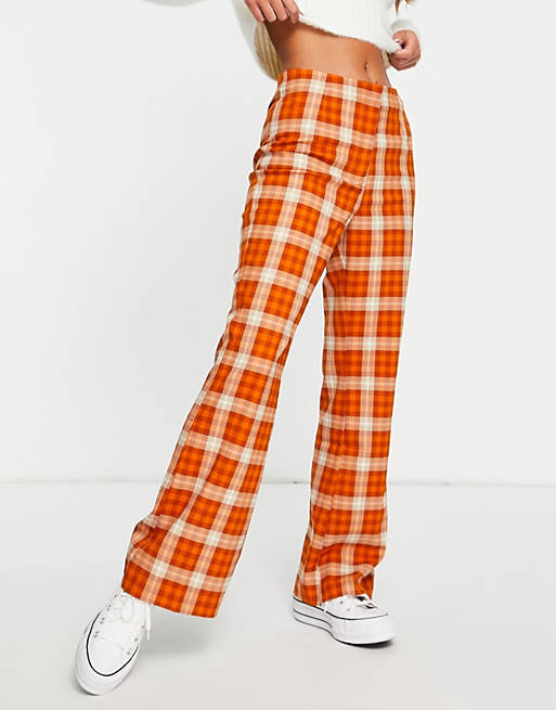  Monki recycled check flare trousers in rust 