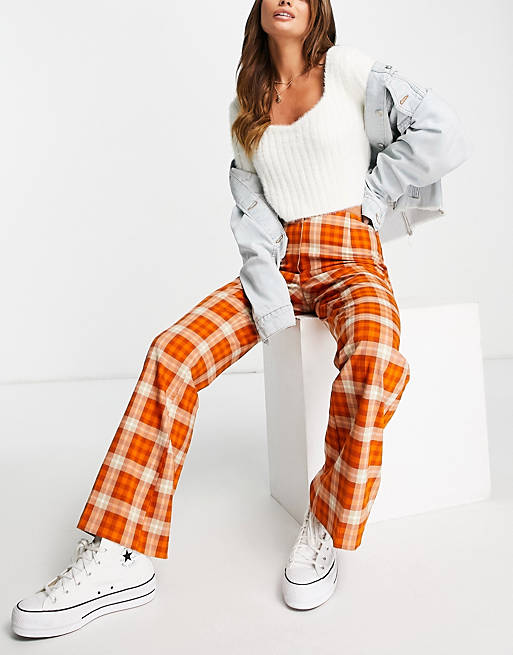  Monki recycled check flare trousers in rust 
