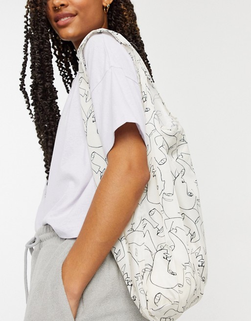 Monki recycled face print tote bag in cream