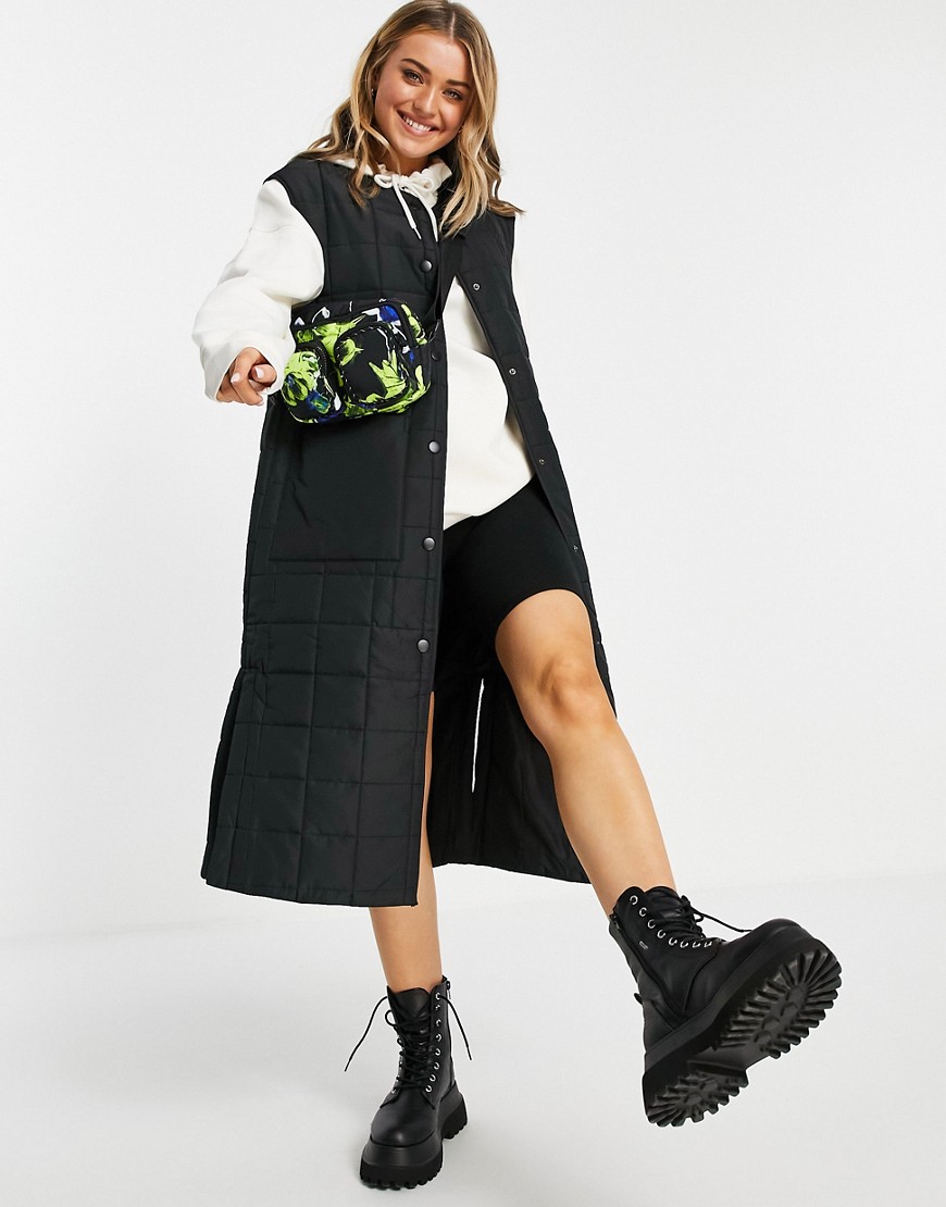 Monki recycled long quilted vest in black
