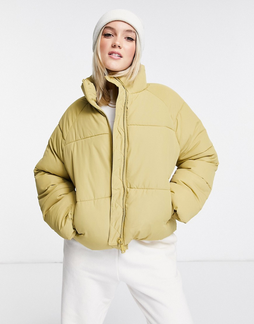 Monki recycled short padded jacket in light yellow-Neutral
