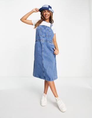 Monki relaxed dungarees with contrast detail in light wash denim