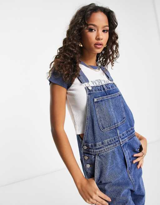 Monki relaxed dungarees with contrast detail in light wash denim