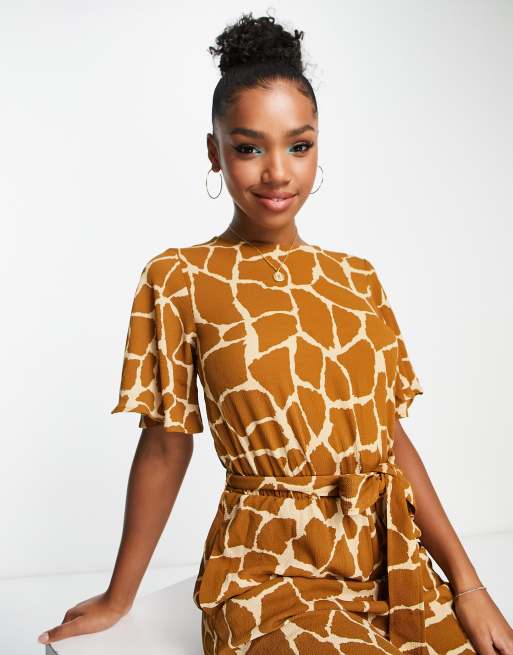 Monki relaxed jumpsuit with tie waist in giraffe print ASOS