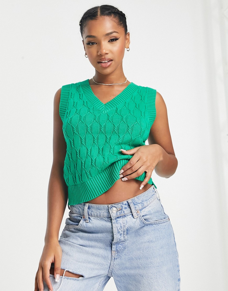 Monki relaxed sweater vest in bright green knit