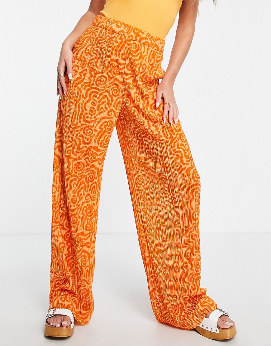 Monki relaxed trousers in swirl print plisse-Orange