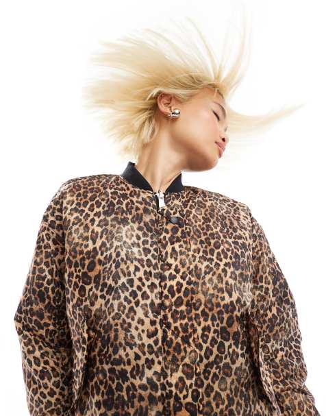 Monki reversible oversized bomber jacket in black quilted star and leopard print - view 1