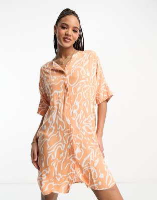 Monki button through mini dress in orange scribble - ASOS Price Checker