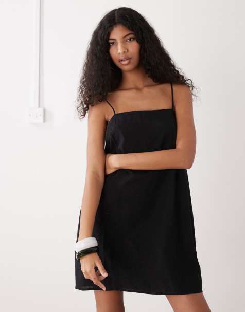 Monki - Robe courte en lin mélangé avec fines bretelles et poches - Noir - view 1