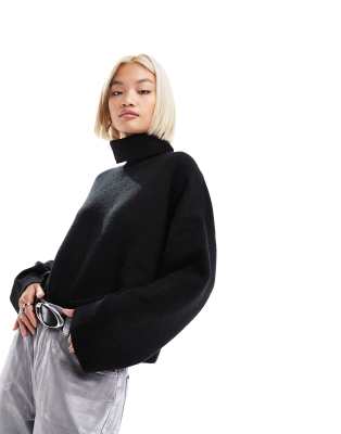 Monki roll neck knitted sweater in black melange