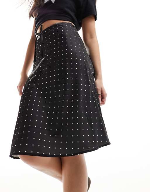 Monki satin a line midi skirt with front bow detail in black and white polka dot