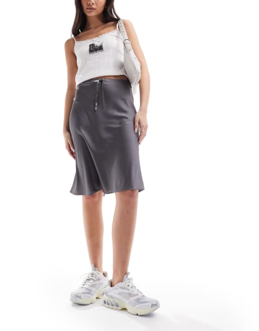 Monki satin a line midi skirt with front bow detail in gray ASOS