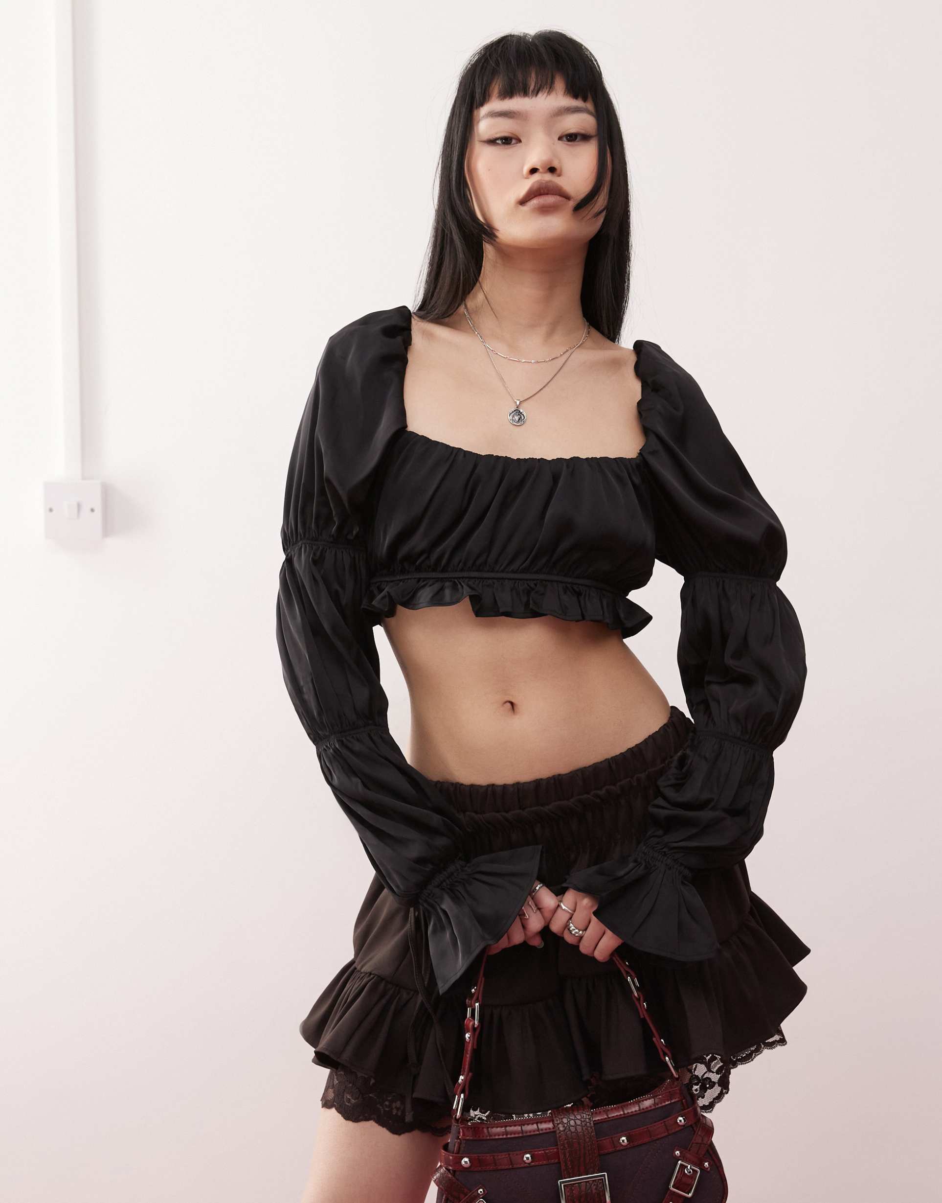 monki satin ruched puff long sleeve crop top in black