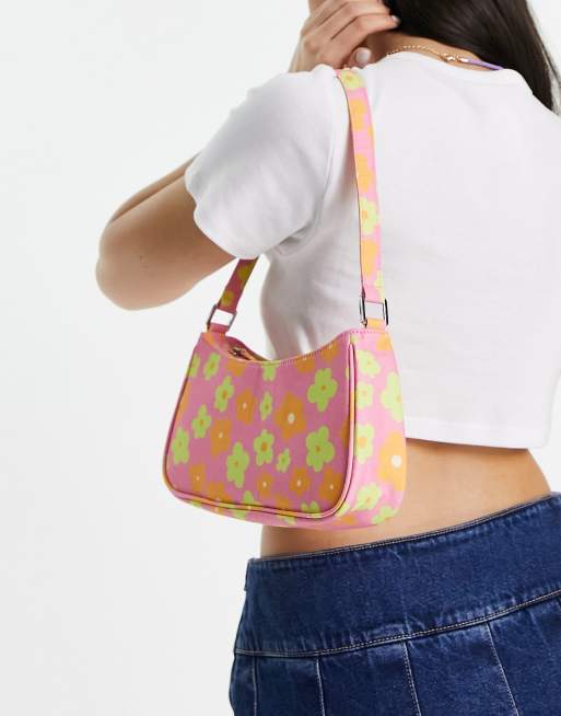 Monki – Schultertasche in Rosa mit Blumendruck ASOS