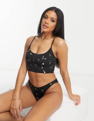 scoop neck bikini top with celestial print in black