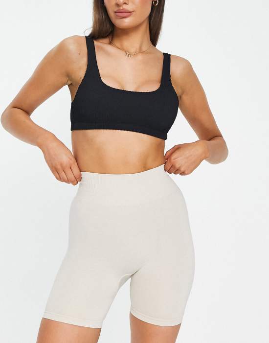 https://images.asos-media.com/products/monki-seamless-sports-legging-shorts-in-beige-melange-part-of-a-set/202573377-4?$n_550w$&wid=550&fit=constrain
