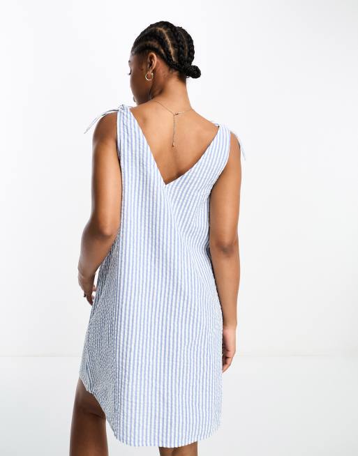 Monki seersucker bow tie strap mini dress with side pockets in